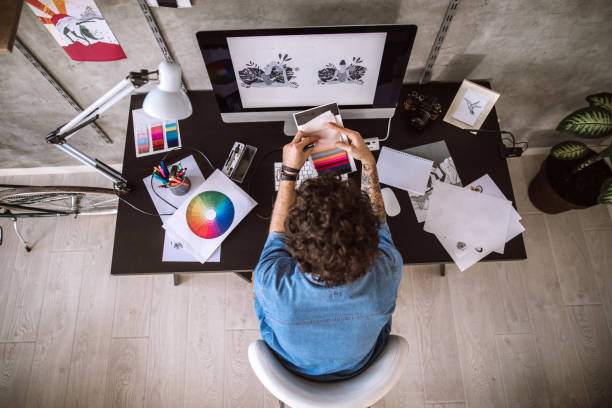 istock Digital Artist Working At Home 1069854392