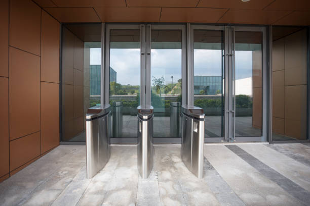 istock security at an entrance gate with key card access control smart office building 1069858064
