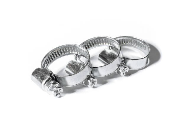 istock Three metal clamps for hose connection isolated on white background close up, macro 1069865532