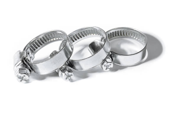 istock Three metal clamps for hose connection isolated on white background close up, macro 1069865554