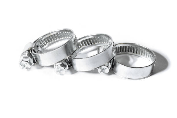 istock Three metal clamps for hose connection isolated on white background close up, macro 1069865602
