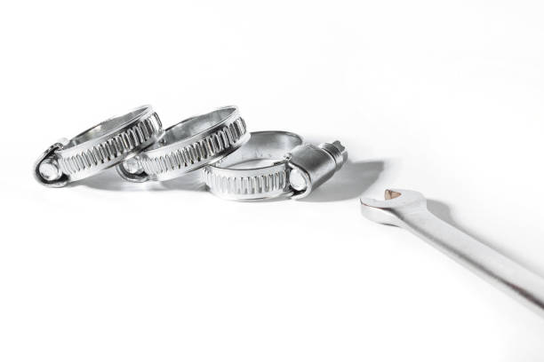 istock Three metal clamps for hose connection isolated on white background close up, macro 1069865810