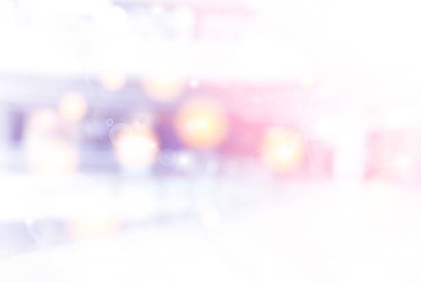 istock Blur shopping mall background with bokeh circle light 1069877834