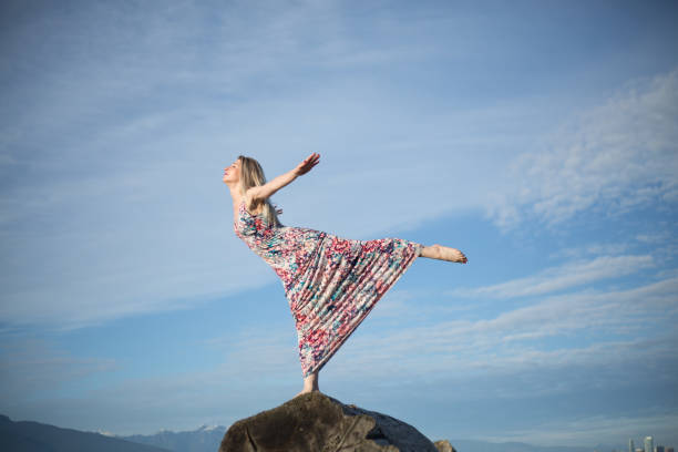 Attractive woman practicing yoga pose copy space