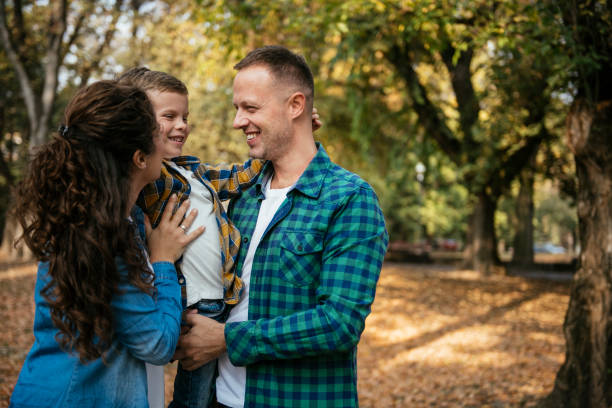 istock Happy family in the park 1069878806
