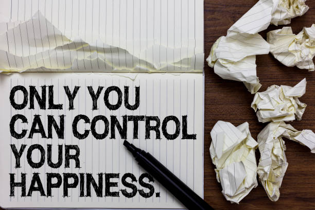 istock Handwriting text writing Only You Can Control Your Happiness.. Concept meaning Personal Self-motivation inspiration Marker over notebook crumpled papers ripped pages several tries mistakes. 1069879586