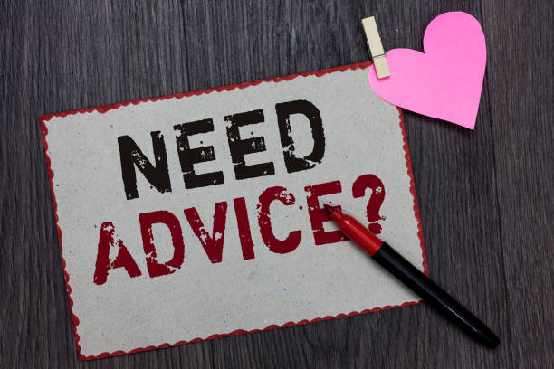 istock Text sign showing Need Advice question. Conceptual photo Asking someone if he want recommendations or guidance White page red borders marker clothespin holds paper heart wood background. 1069879682
