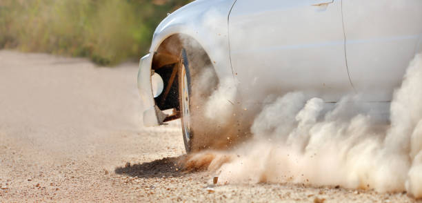 istock Rally racing car in dirt track. 1069884152