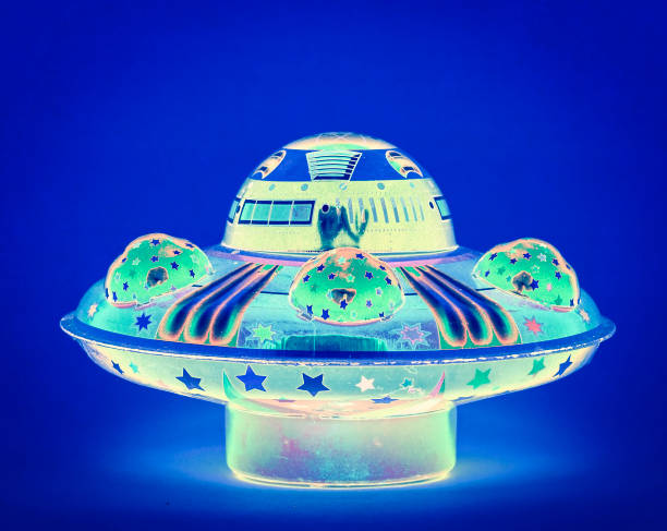 istock surrealistic  UFO  toy in bright blue 1069895372