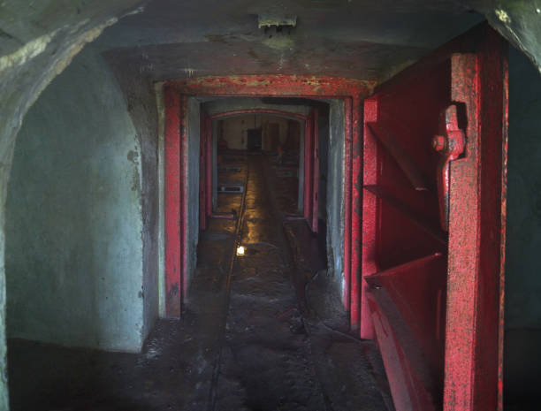 istock Old Fallout shelter with thick metal opened door 1069907440
