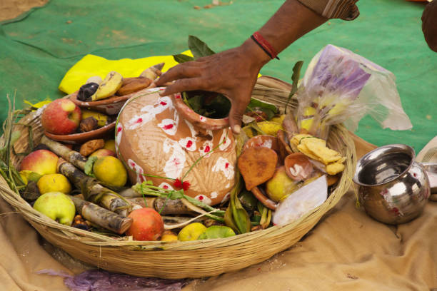 istock people gathered at river bed and offering fruit and vegetable to sun god 1069908092