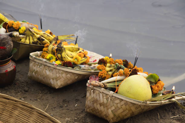 istock people gathered at river bed and offering fruit and vegetable to sun god 1069910786
