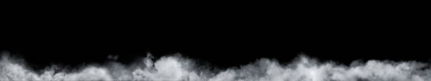 Panoramic view of the abstract fog or smoke move on black background. White cloudiness, mist or smog background. Panoramic view of the abstract fog or smoke move on black background. White cloudiness, mist or smog background. thick photos stock pictures, royalty-free photos & images