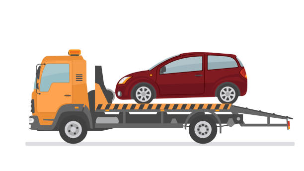 istock Broken car on tow truck. Isolated on white background. 1069913696