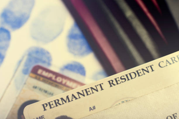 istock Passport and green card 1069915818