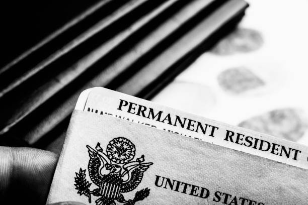 istock Passport and green card 1069917022