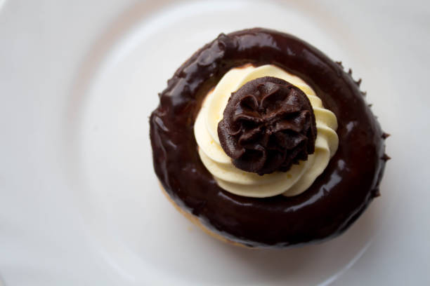 istock a delicious rum cake with chocolate and butter cream on a plate 1069919792