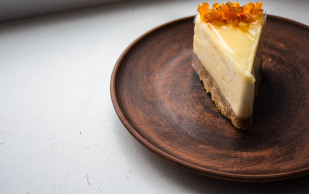 istock a cheesecake with candied fruit on a plate 1069919804