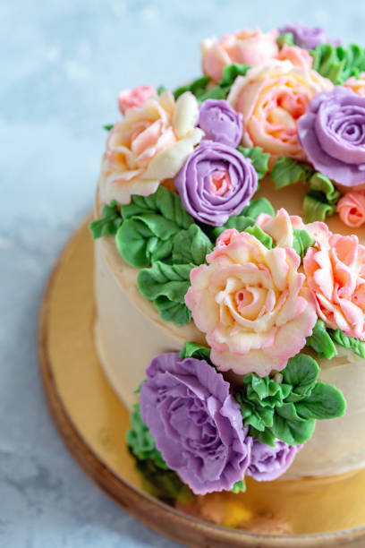 istock Cake with buttercream roses close-up. 1069922794