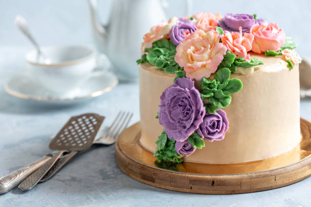 istock Holiday cake with cream flowers. 1069923966
