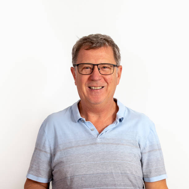 istock fifty year old mature man with glasses 1069924392