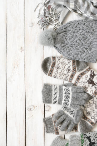 istock Warm woolen knitwear on wood 1069926914