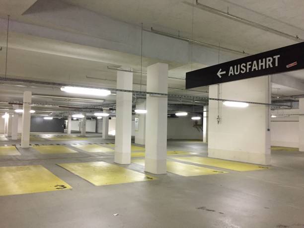 istock Empty parking lot. No Cars, empty parking spaces 1069927858