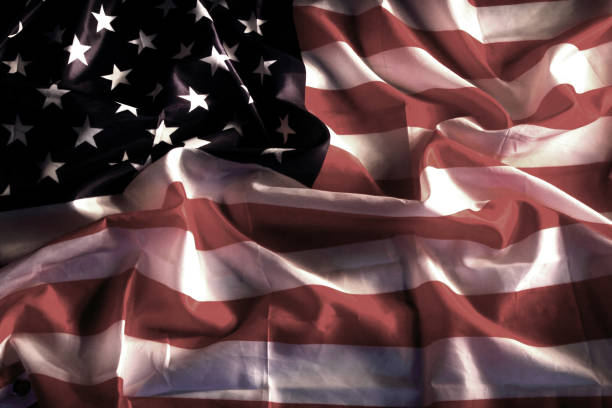 istock USA flag in the dark 1069928022