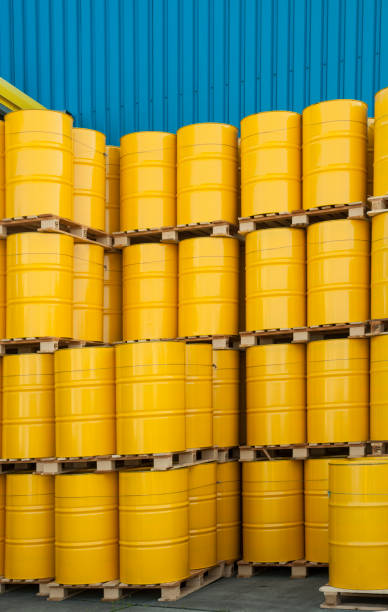 istock Stack of yellow oil drums 1069930506