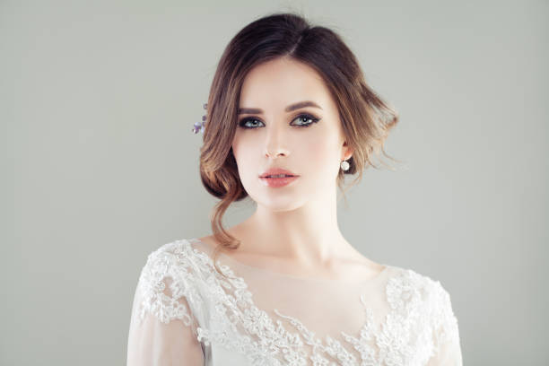 istock Cheerful young woman with makeup portrait 1069934298