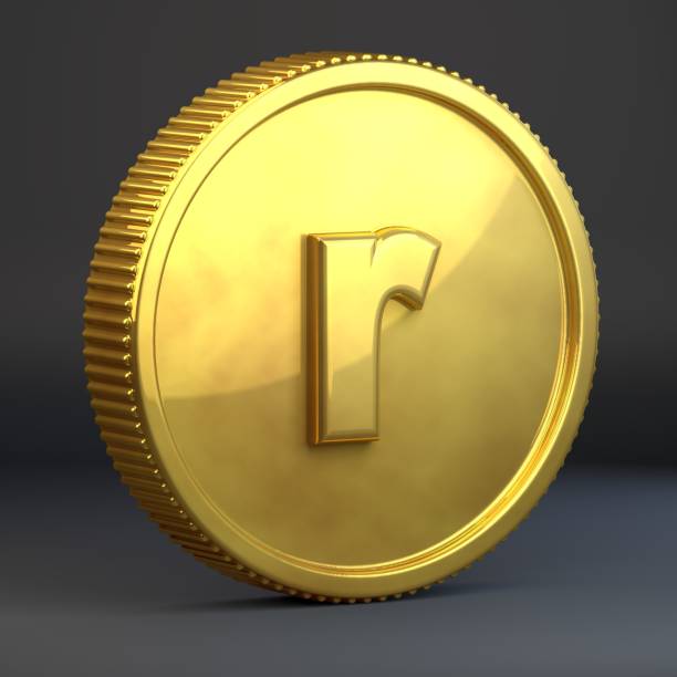 istock Golden coin with letter R lowercase isolated on black background. 1069936458