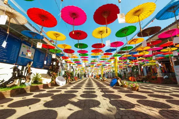 Colorful paper handmade umbrellas at Wat Tha Luk, Chiangmai, Thailand