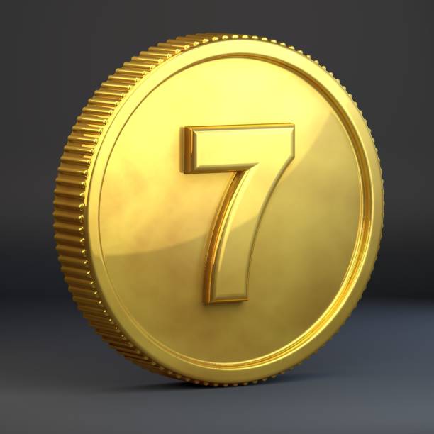 istock Golden coin with number 7 isolated on black background. 1069940838