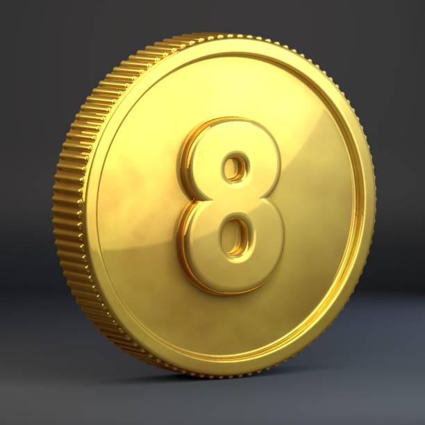 istock Golden coin with number 8 isolated on black background. 1069940918
