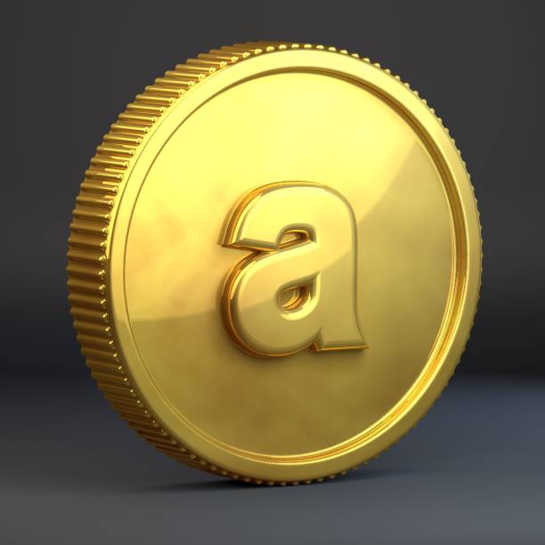 istock Golden coin with letter A lowercase isolated on black background. 1069941140