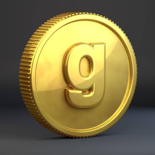 istock Golden coin with letter G lowercase isolated on black background. 1069941184