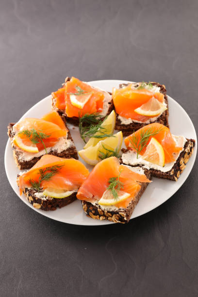 istock canape with cream and salmon 1069941428