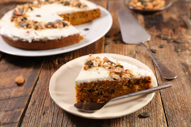 carrot cake and cream carrot cake and cream carrot cake stock pictures, royalty-free photos & images