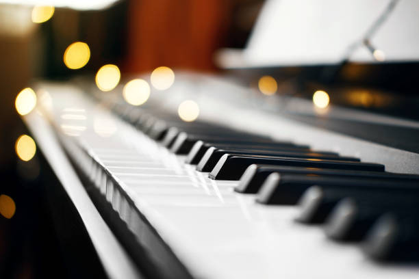 istock piano keys bokeh on background 1069942744