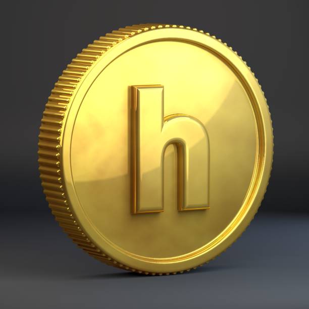 istock Golden coin with letter H lowercase isolated on black background. 1069943204