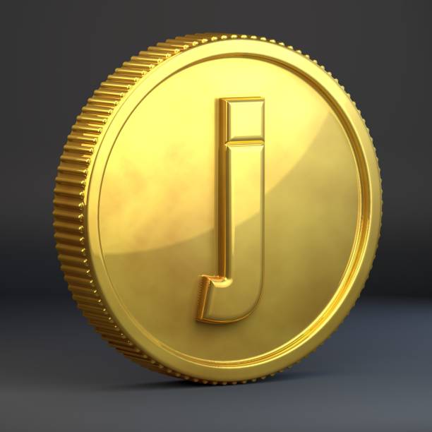 istock Golden coin with letter J lowercase isolated on black background. 1069943350