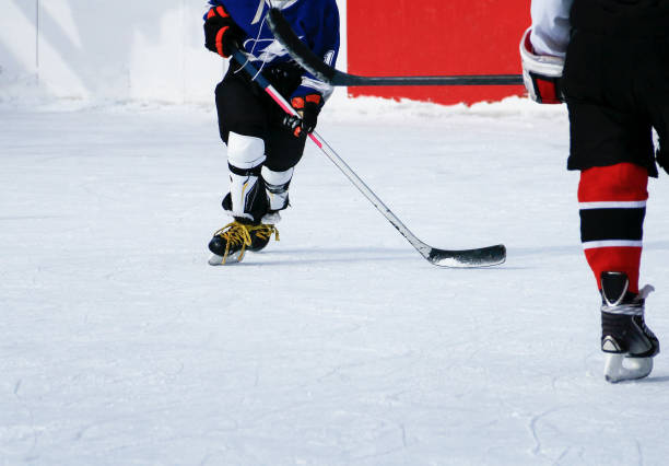 istock Kids at ice hockey practice. 1069944370