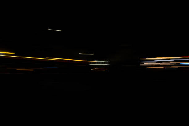 istock Slurred and stretched street lights in Paris at night 1069949730