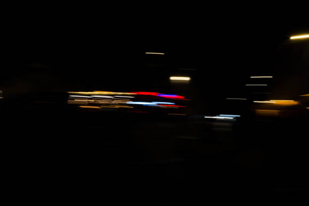 istock Slurred and stretched street lights in Paris at night 1069949746