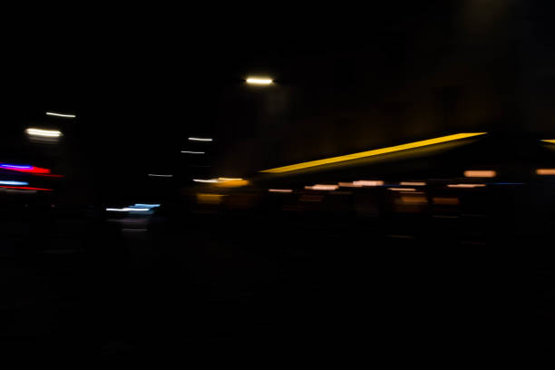 istock Slurred and stretched street lights in Paris at night 1069949760