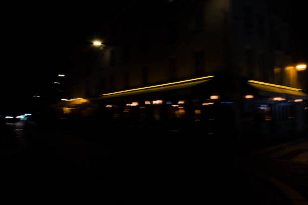istock Slurred and stretched street lights in Paris at night 1069949780