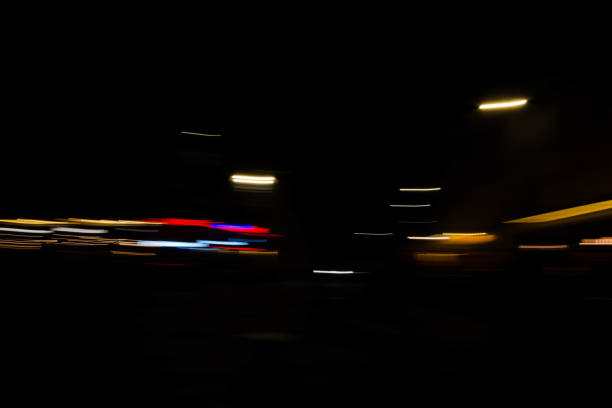 istock Slurred and stretched street lights in Paris at night 1069949816