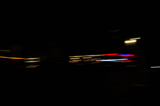 istock Slurred and stretched street lights in Paris at night 1069949852