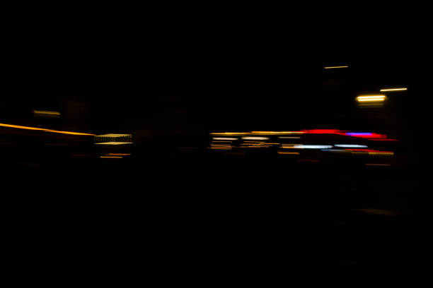 istock Slurred and stretched street lights in Paris at night 1069949866
