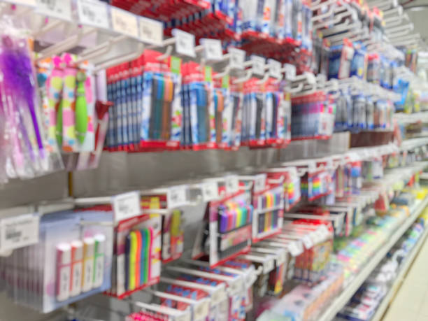 Blurred of stationery shop have many accessories such as pen, pencil, eraser, color, correction pen, post-it note, highlighting pen, ink and etc. Side view of School supplies on shelf for students. Blurred of stationery shop have many accessories such as pen, pencil, eraser, color, correction pen, post-it note, highlighting pen, ink and etc. Side view of School supplies on shelf for students. office supply stock pictures, royalty-free photos & images